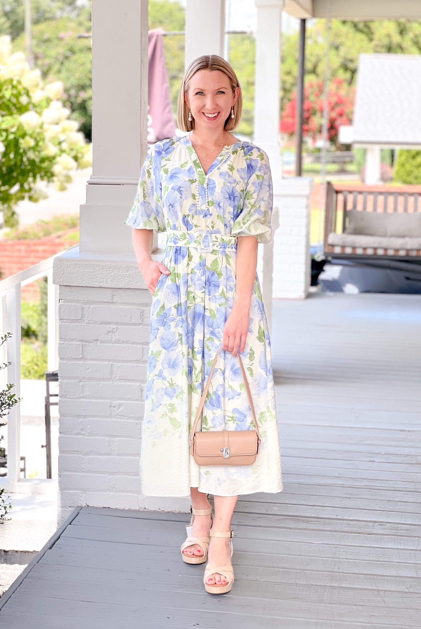 blue floral dress with short sleeves, matching belt, in a midi length