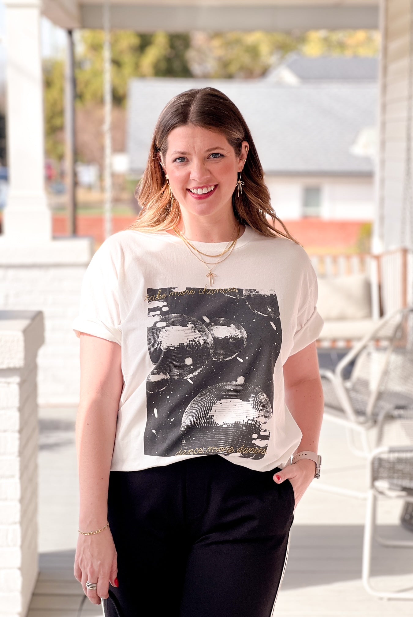 white graphic tee with disco balls