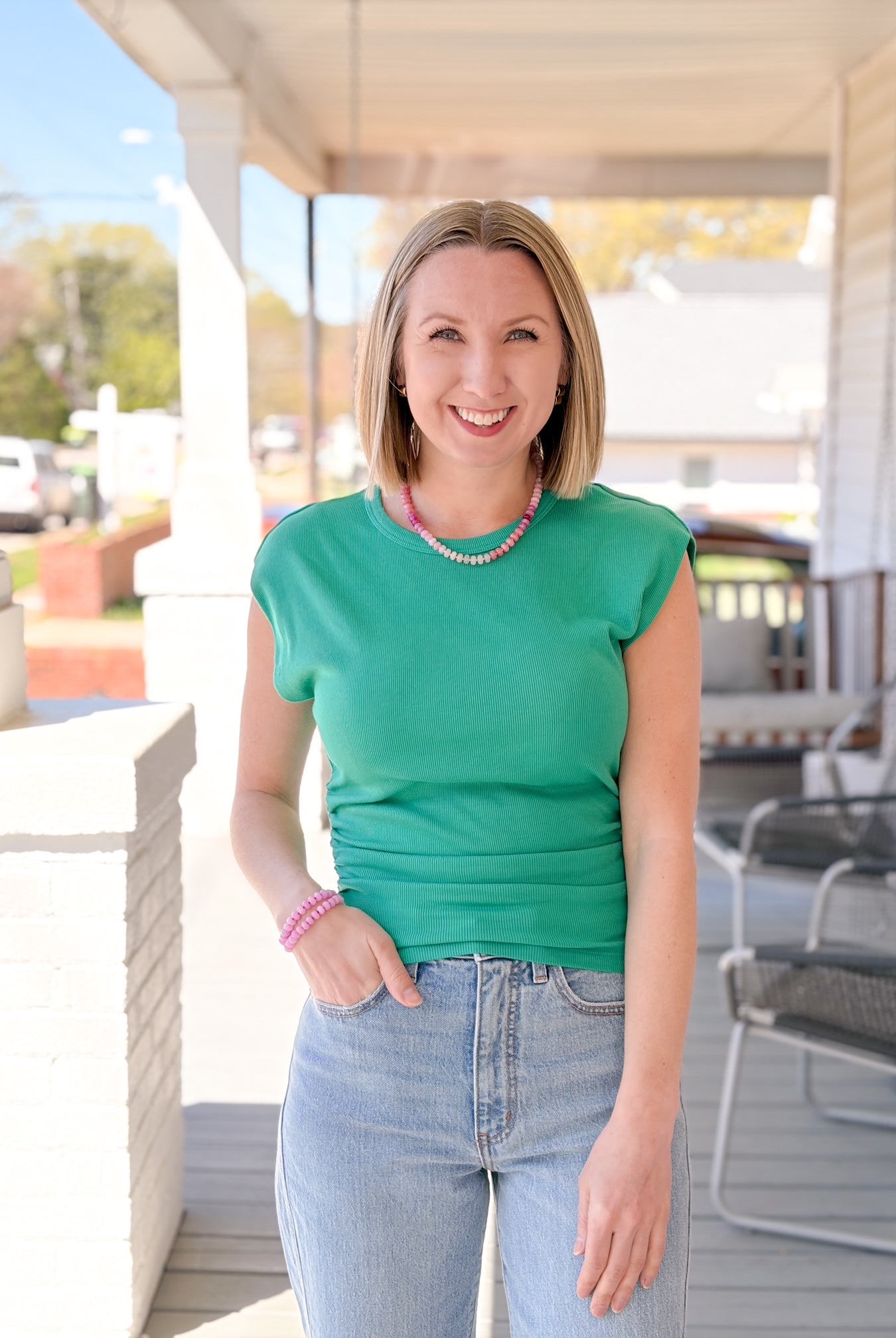 sleeveless green top