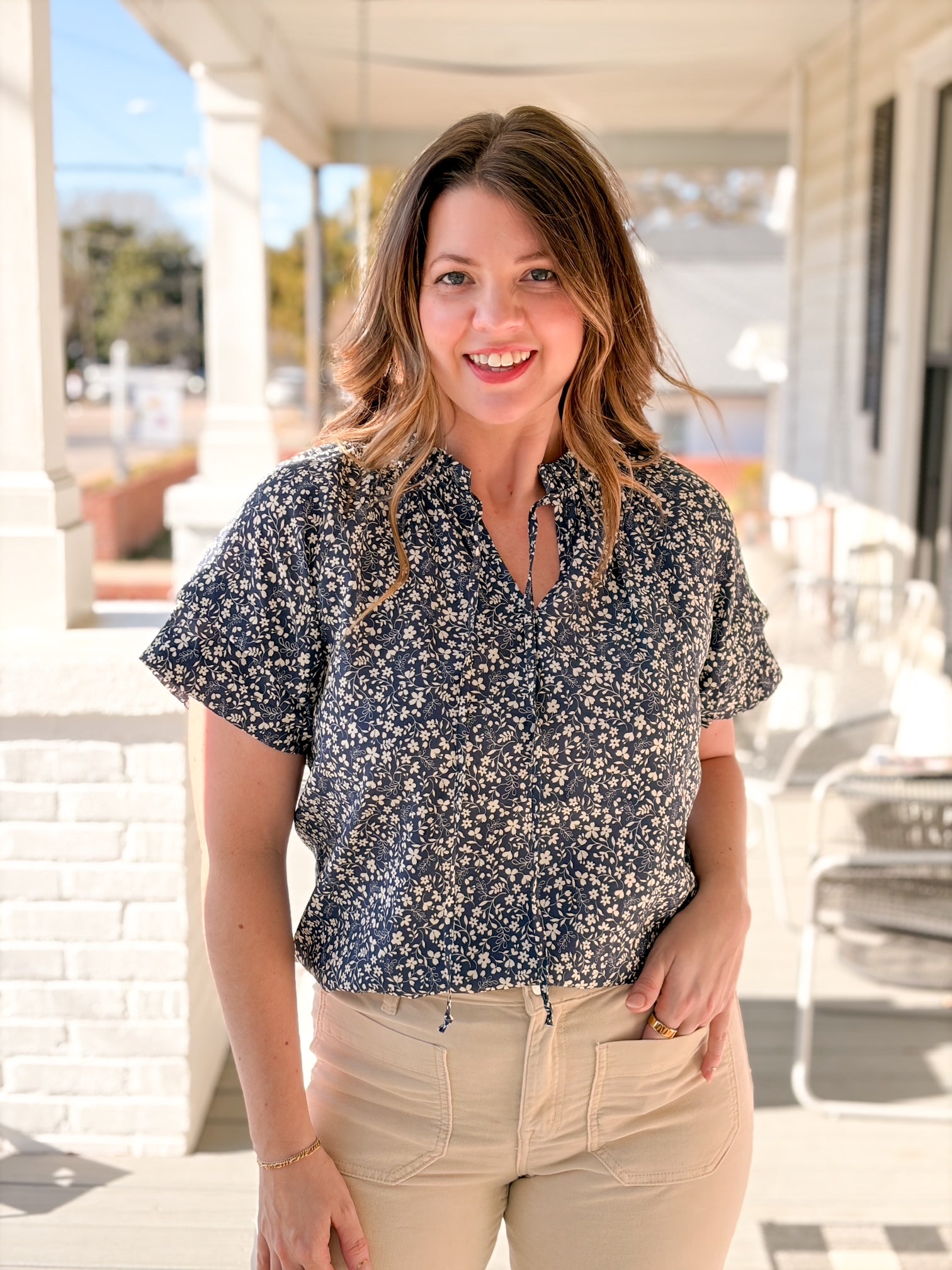 short sleeve top with navy floral pattern
