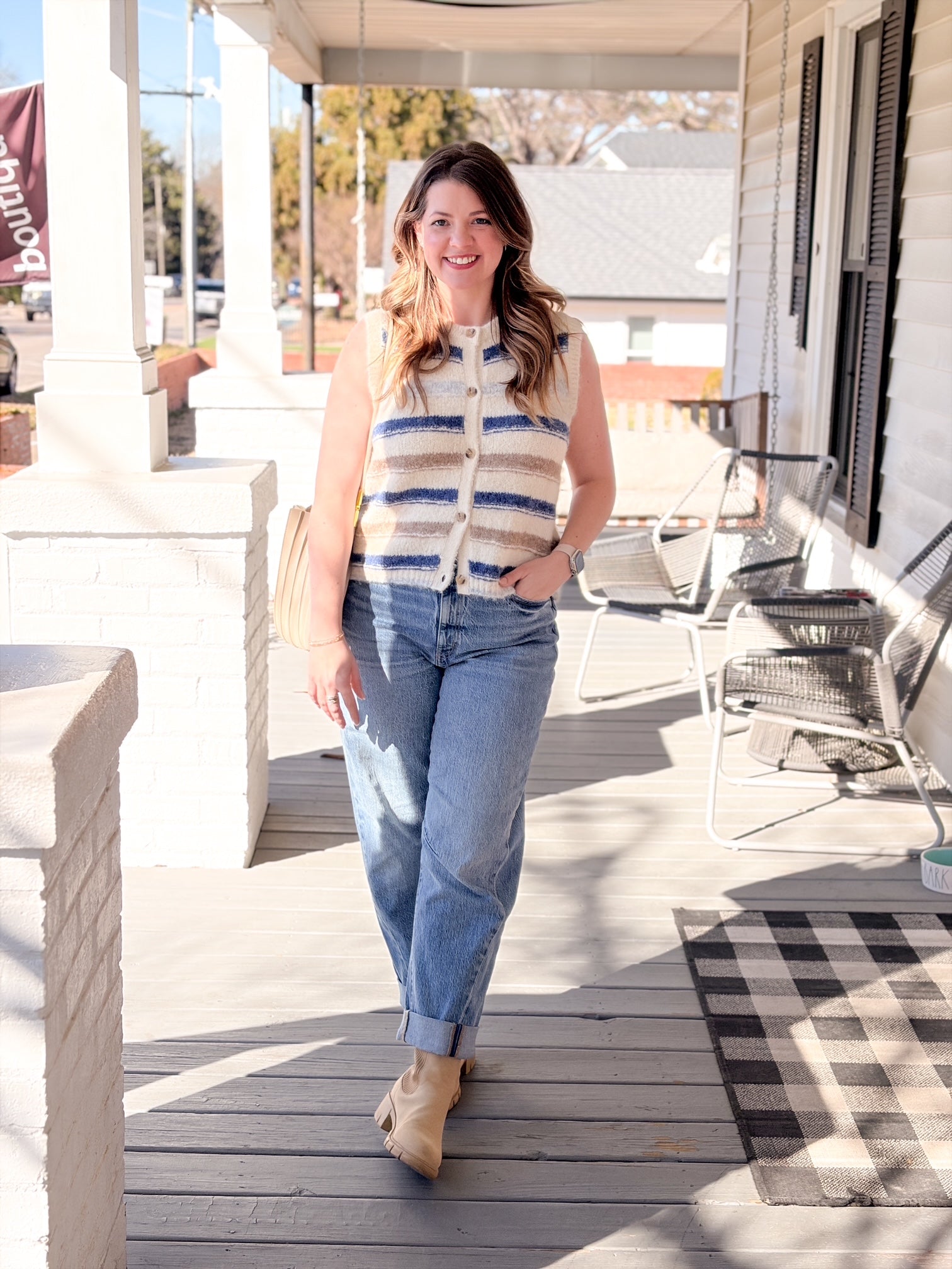 cream vest with blue and tan stripes