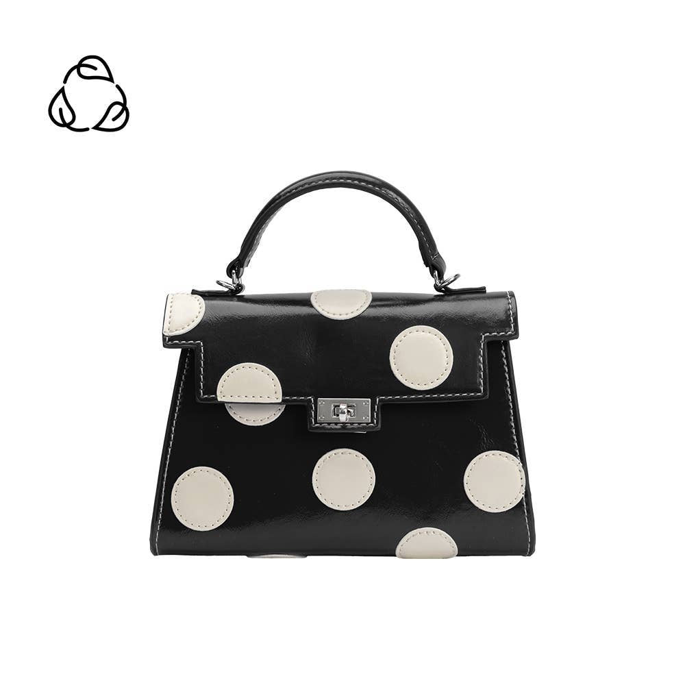 black handbag with large white polka dots
