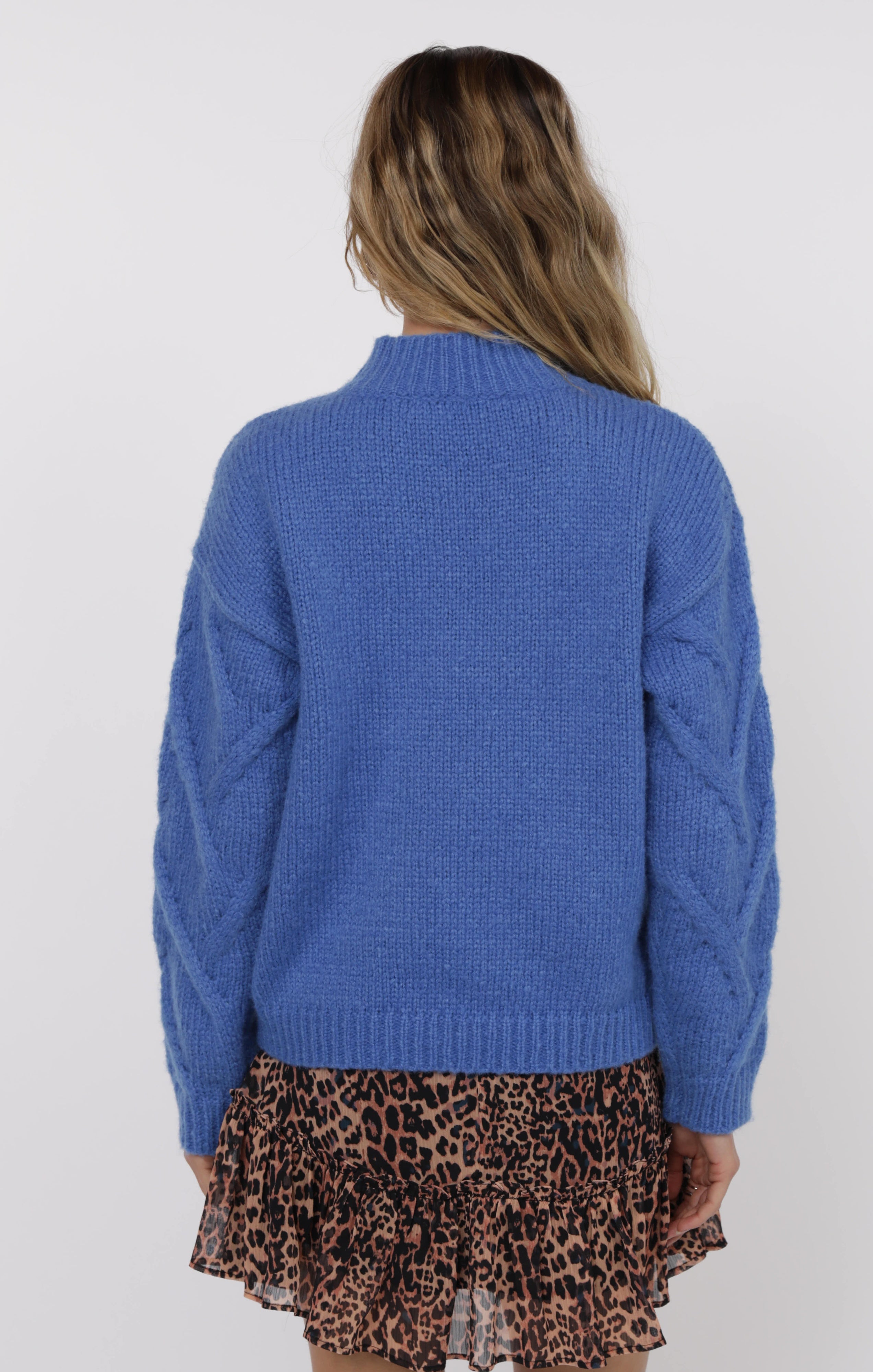 blue sweater with herringbone pattern