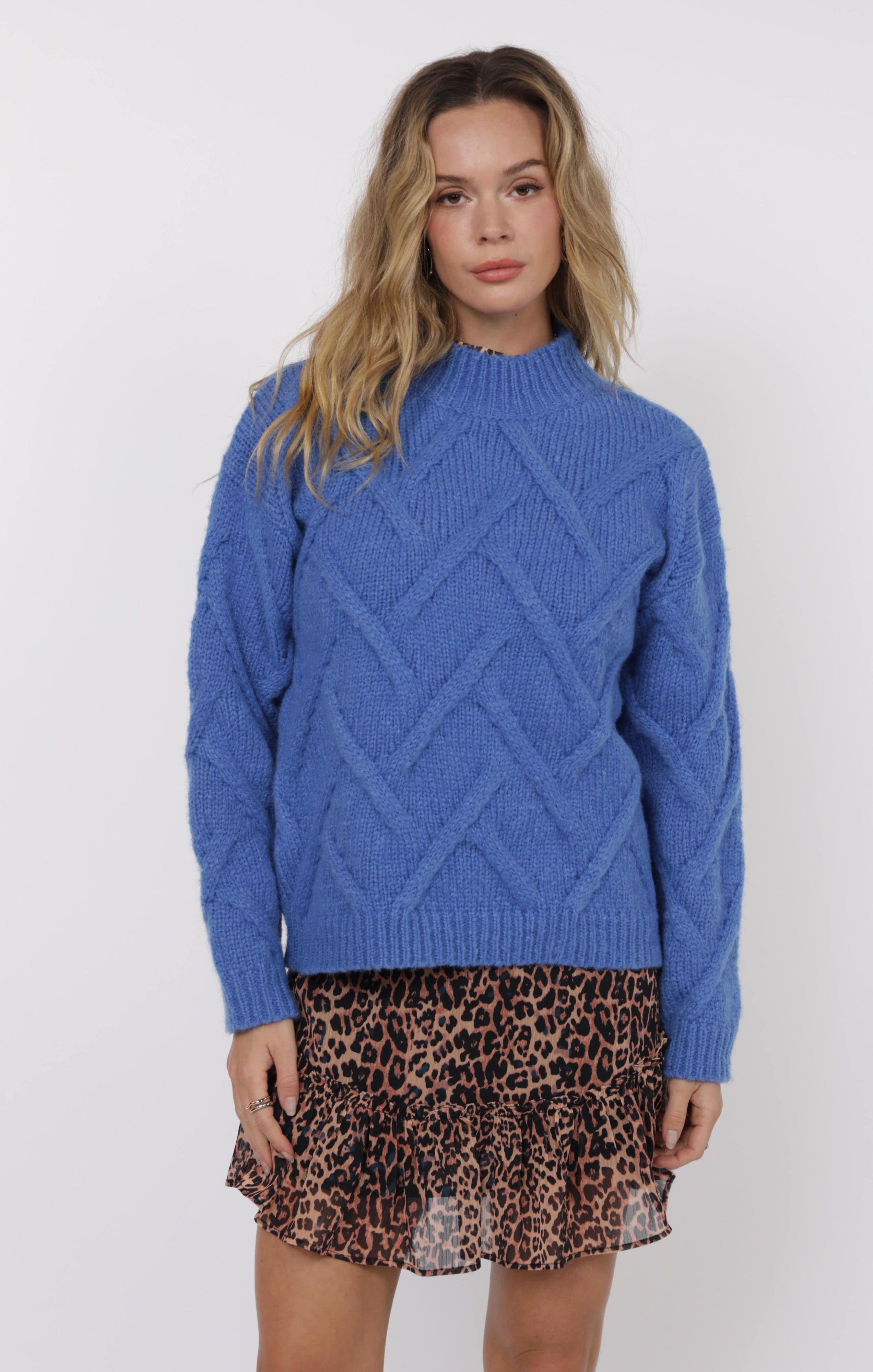 blue sweater with herringbone pattern