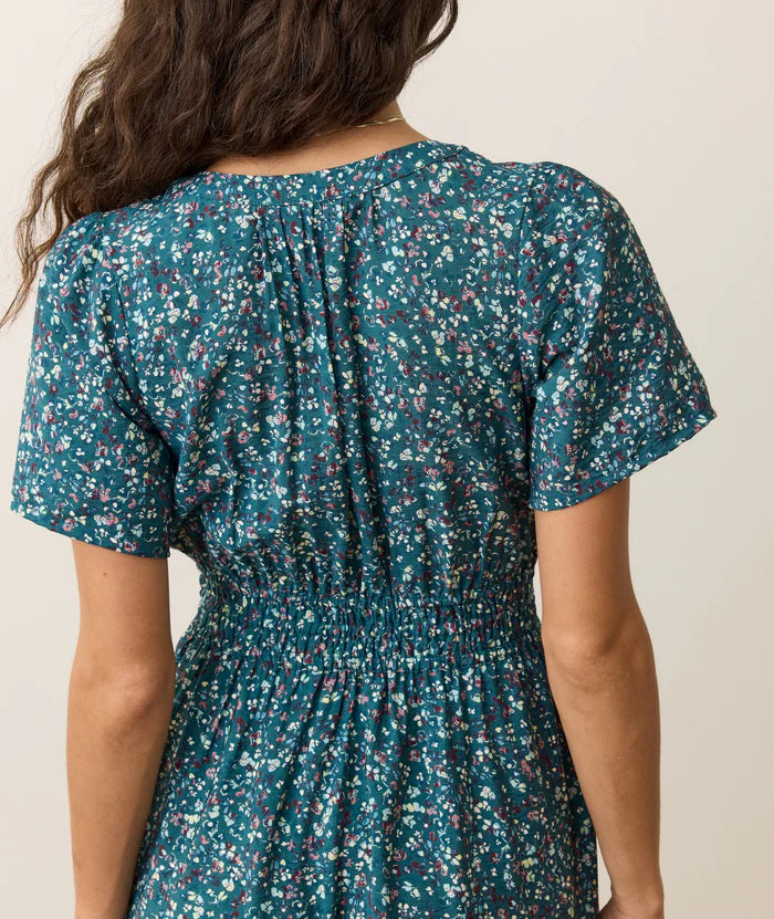 midi length a line dress with v neckline, teal floral pattern, short sleeves