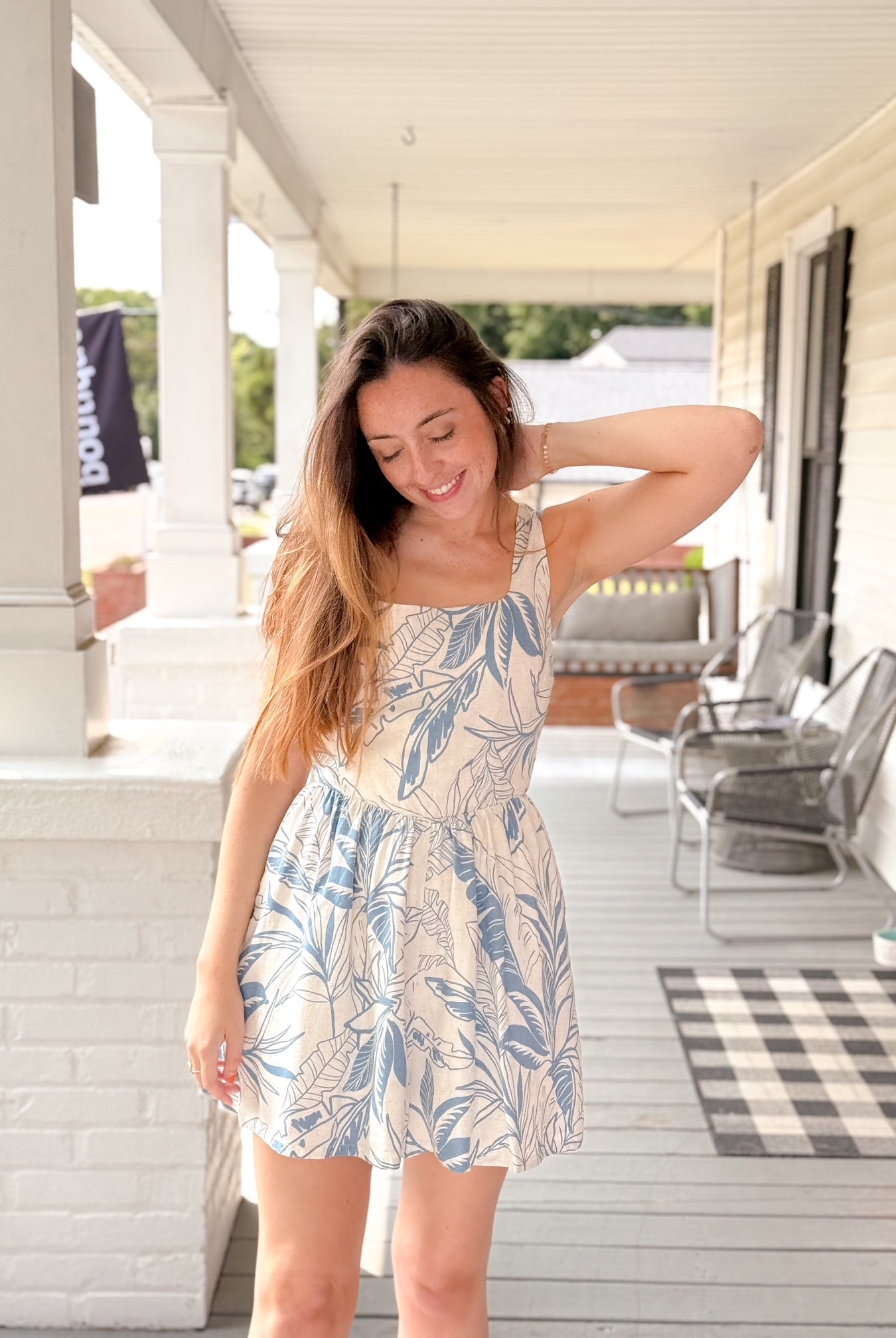 blue and ivory romper with flowy shorts and square neckline