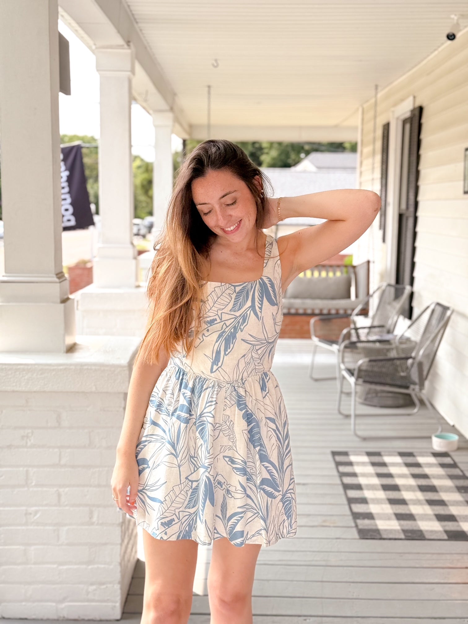blue and ivory romper with flowy shorts and square neckline