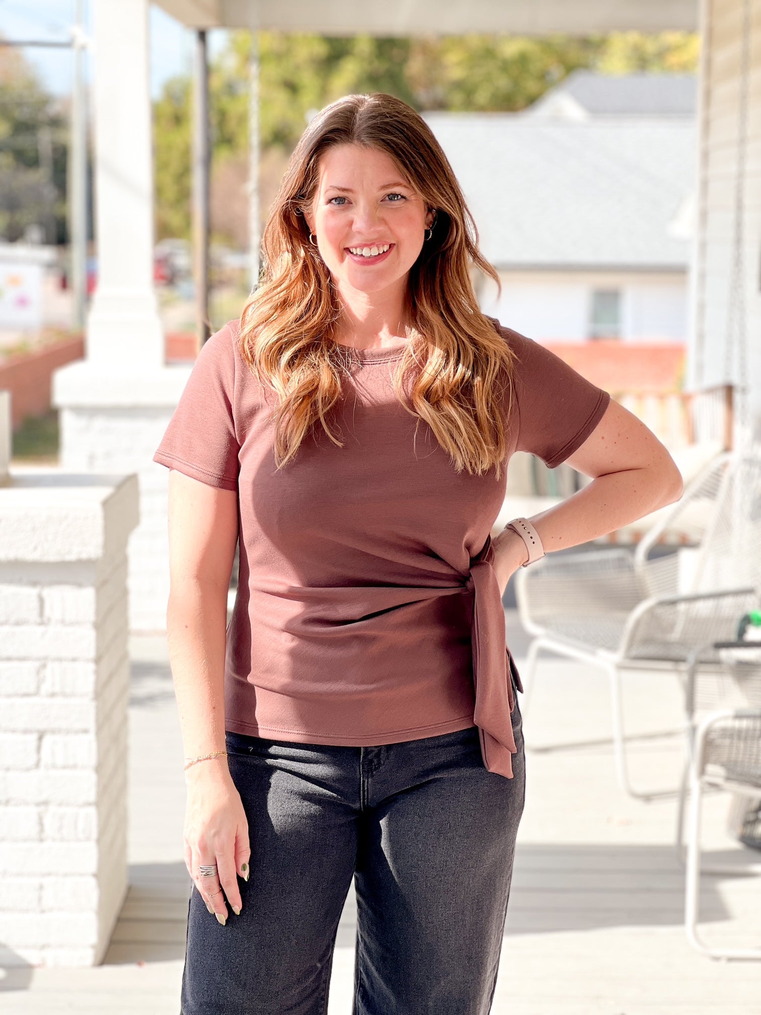 short sleeve top with crew neckline and front twist detail