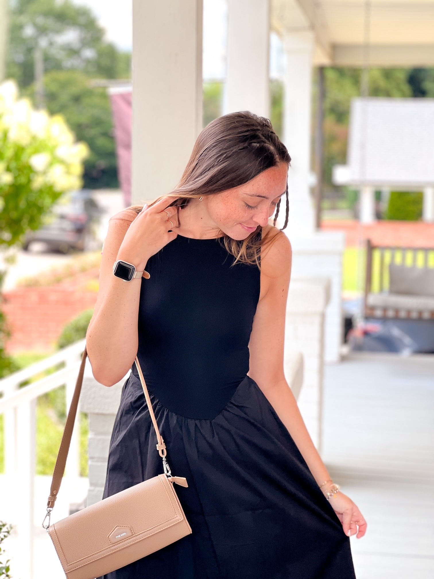 midi length black dress with align skirt and open back