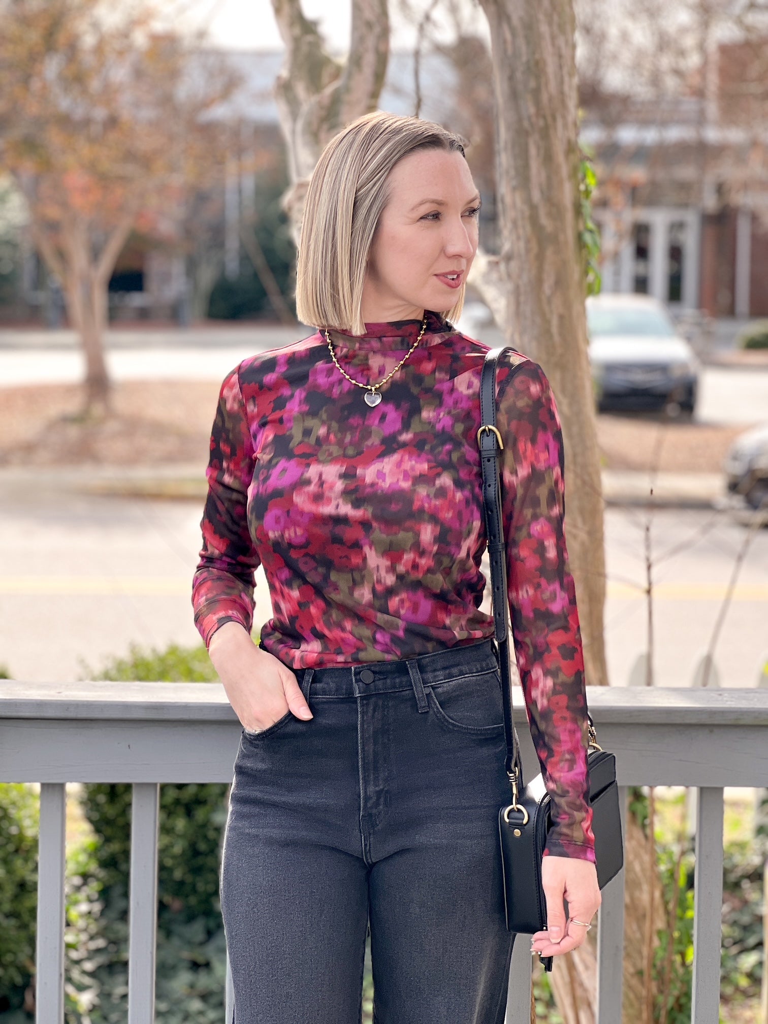 long sleeve top with crew neckline and berry floral pattern