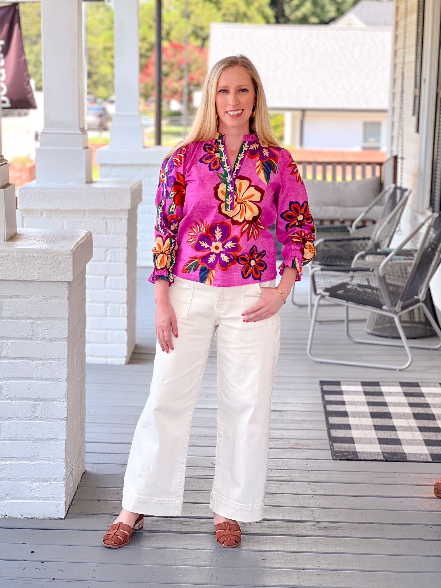 long sleeve work top with v neckline, bright purple pattern with floral