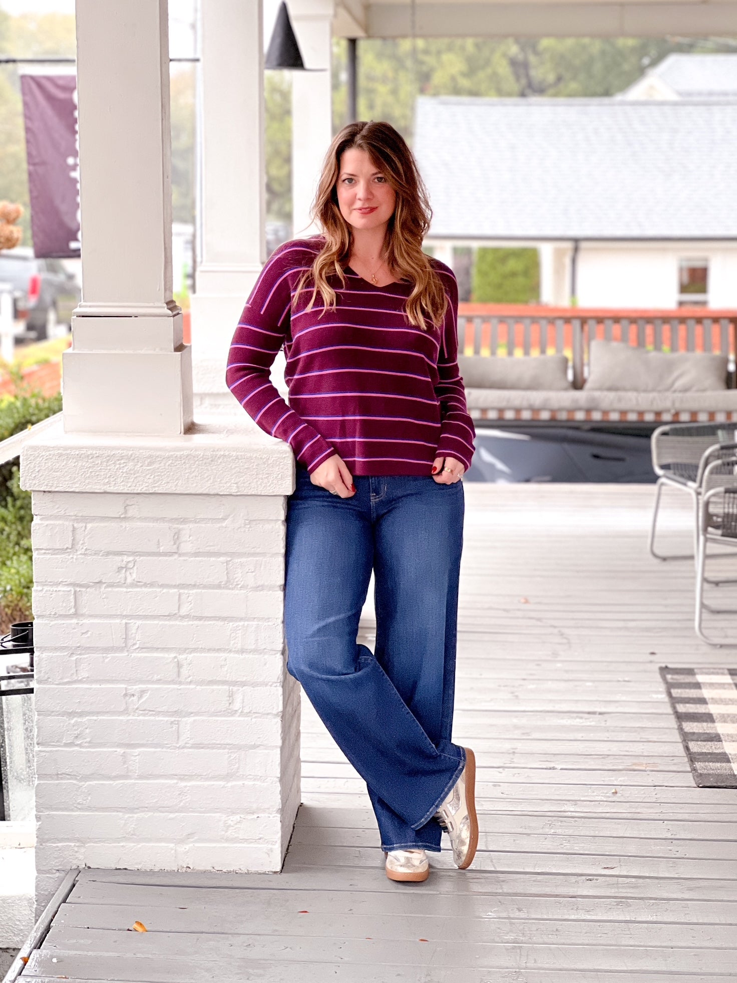 wine sweater with v neckline and long sleeves, small stripes