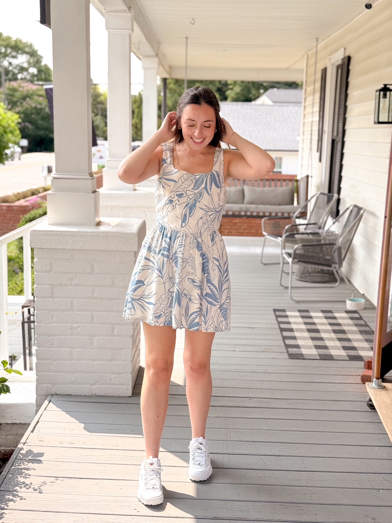 blue and ivory romper with flowy shorts and square neckline