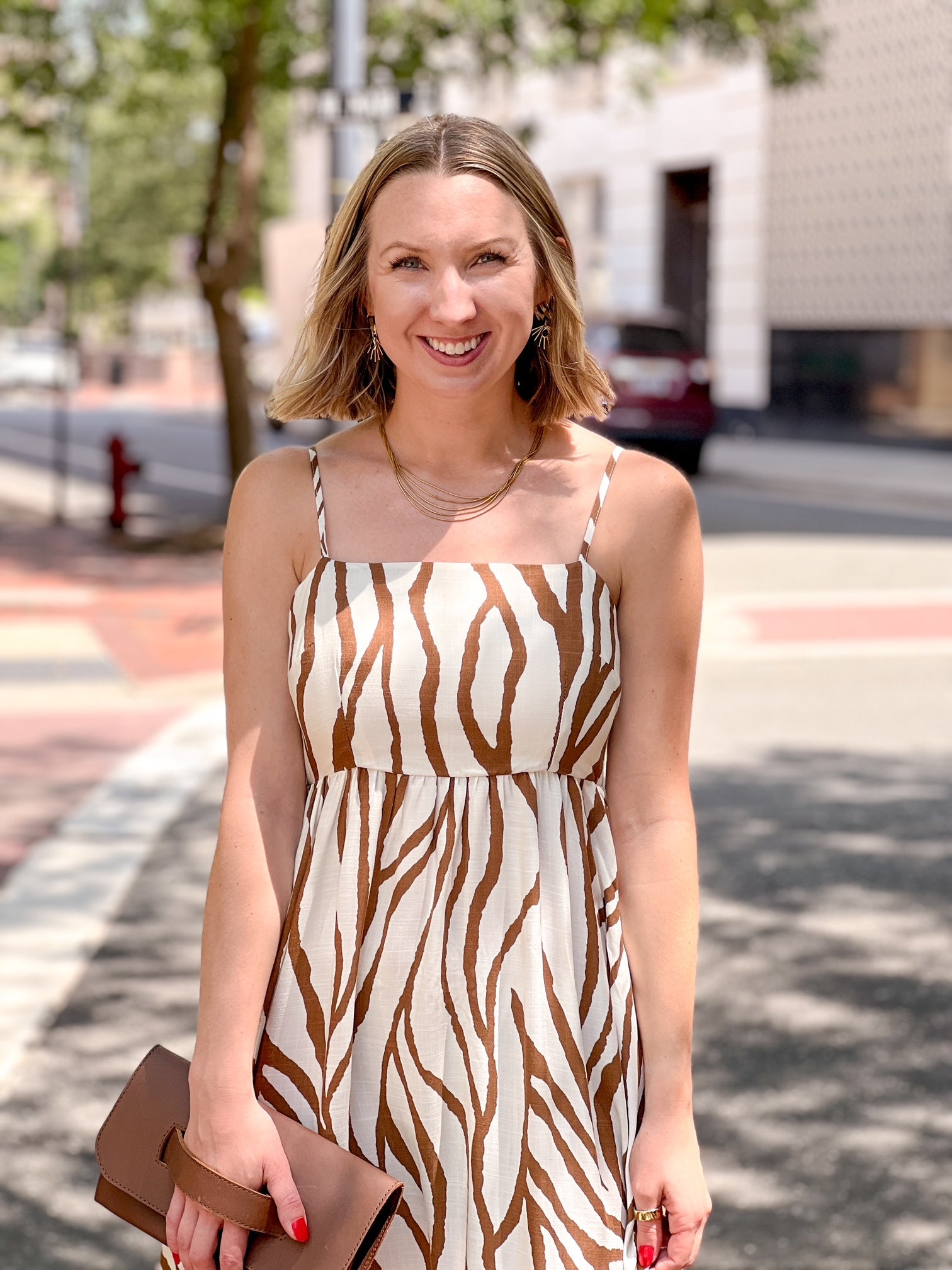 midi length cream dress with brown pattern