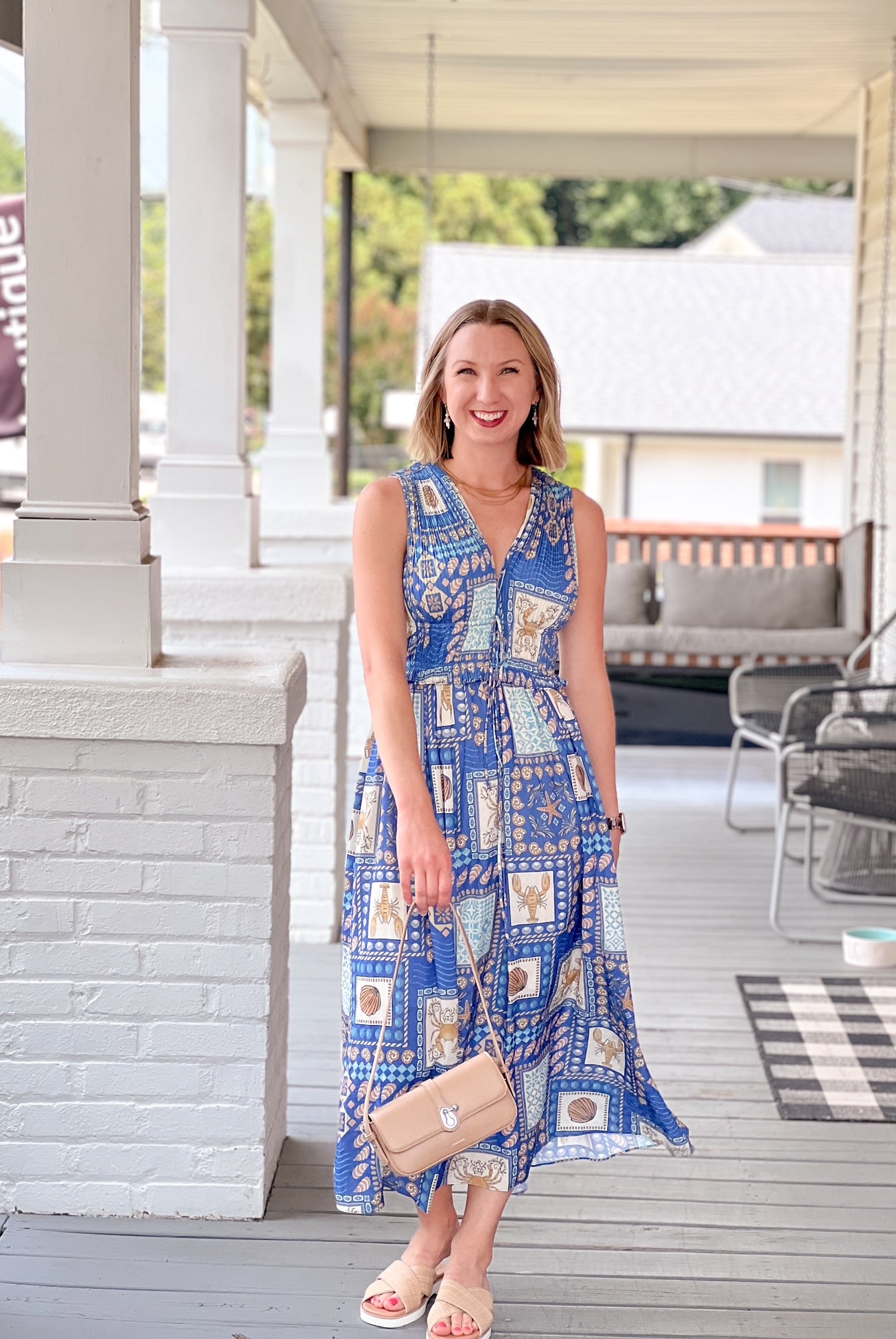 midi length blue dress with beach themed pattern