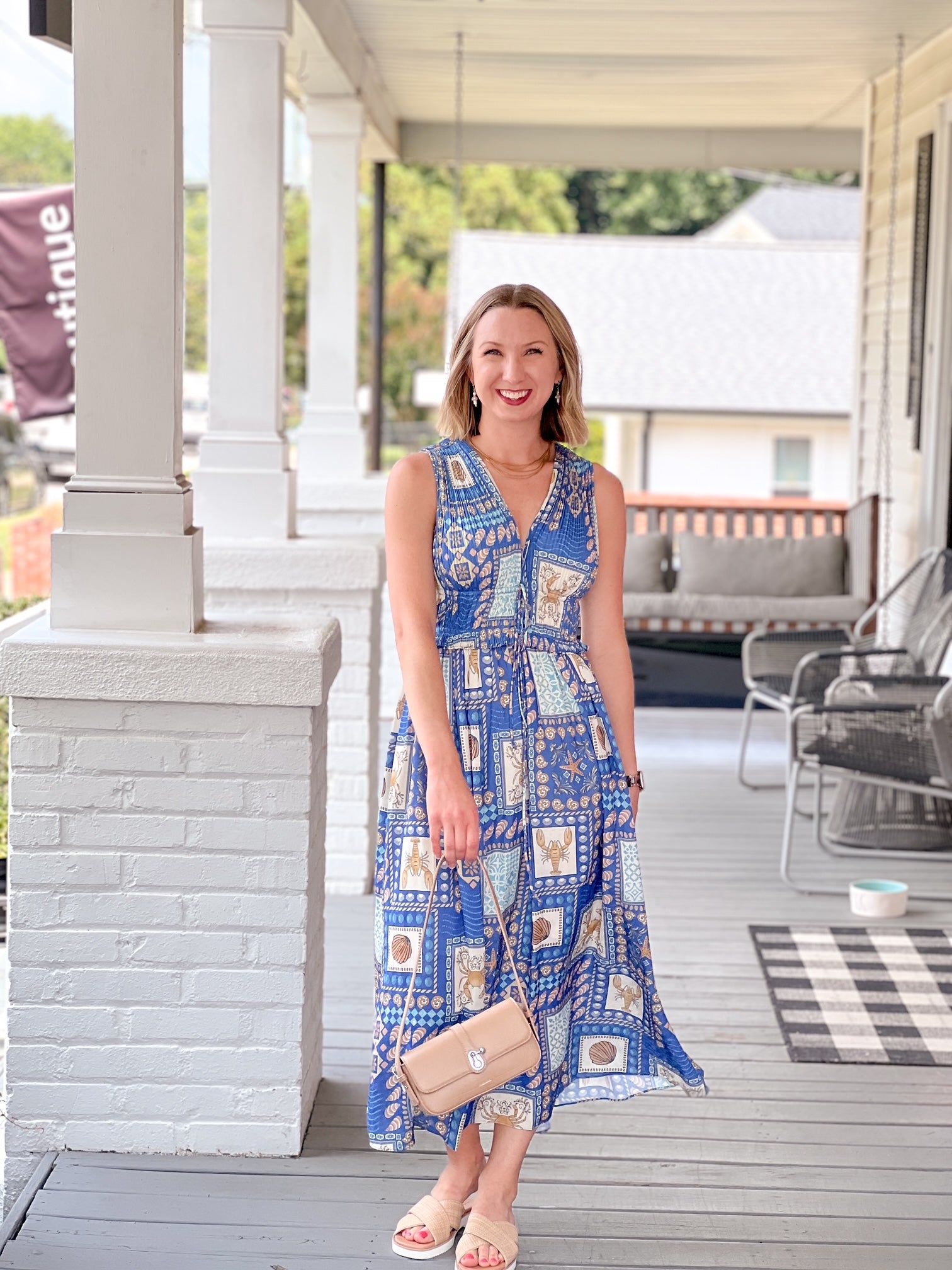 midi length blue dress with beach themed pattern