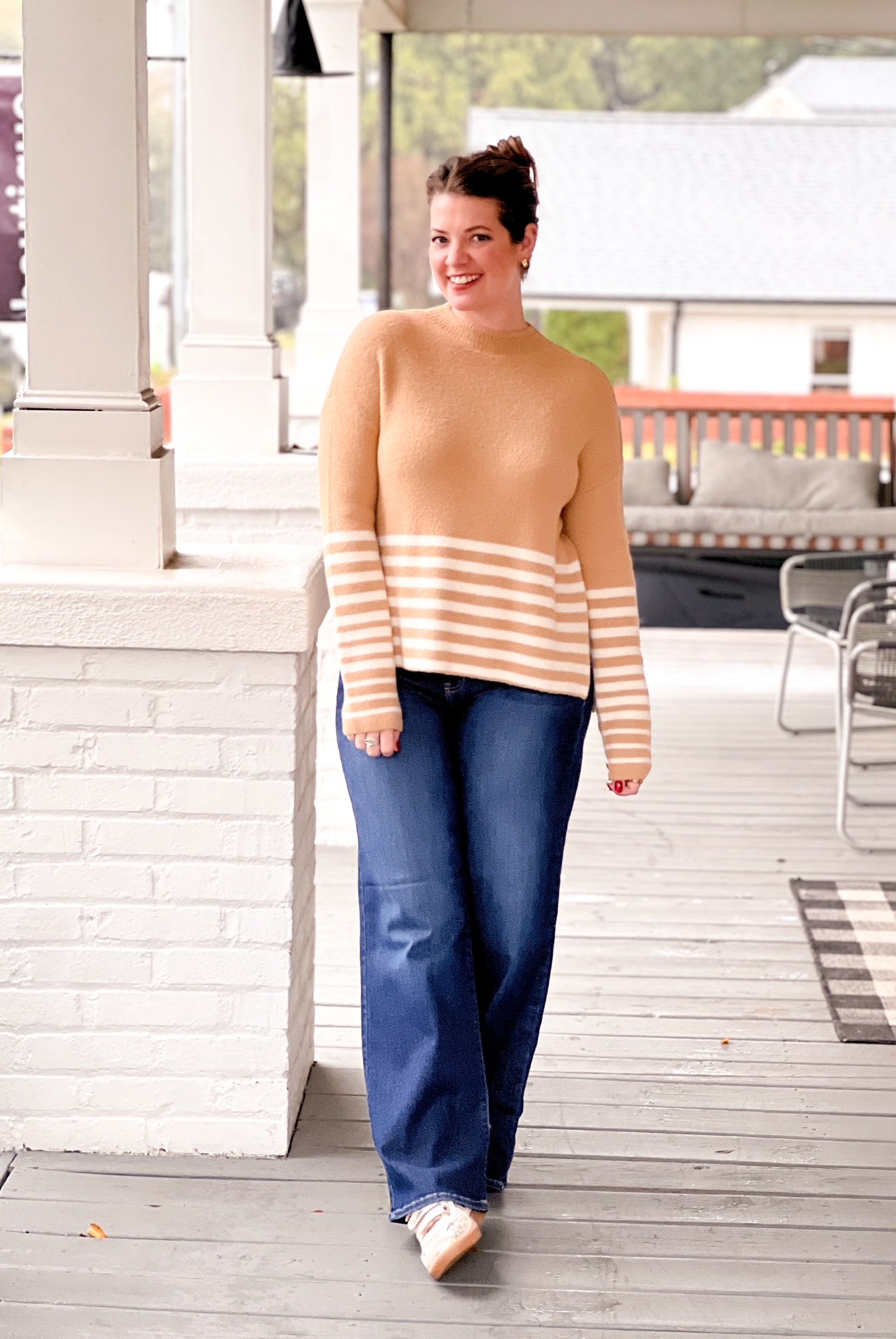 caramel sweater with white stripe detailing on bottom