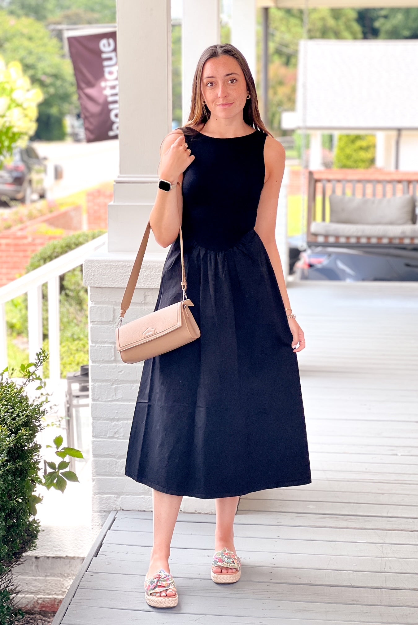 midi length black dress with align skirt and open back