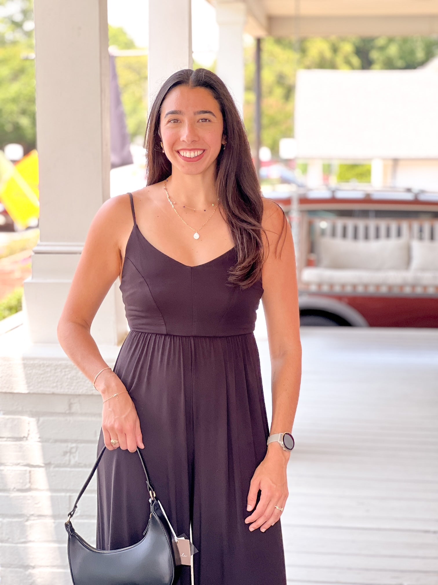 black jumpsuit wide leg sleeveless