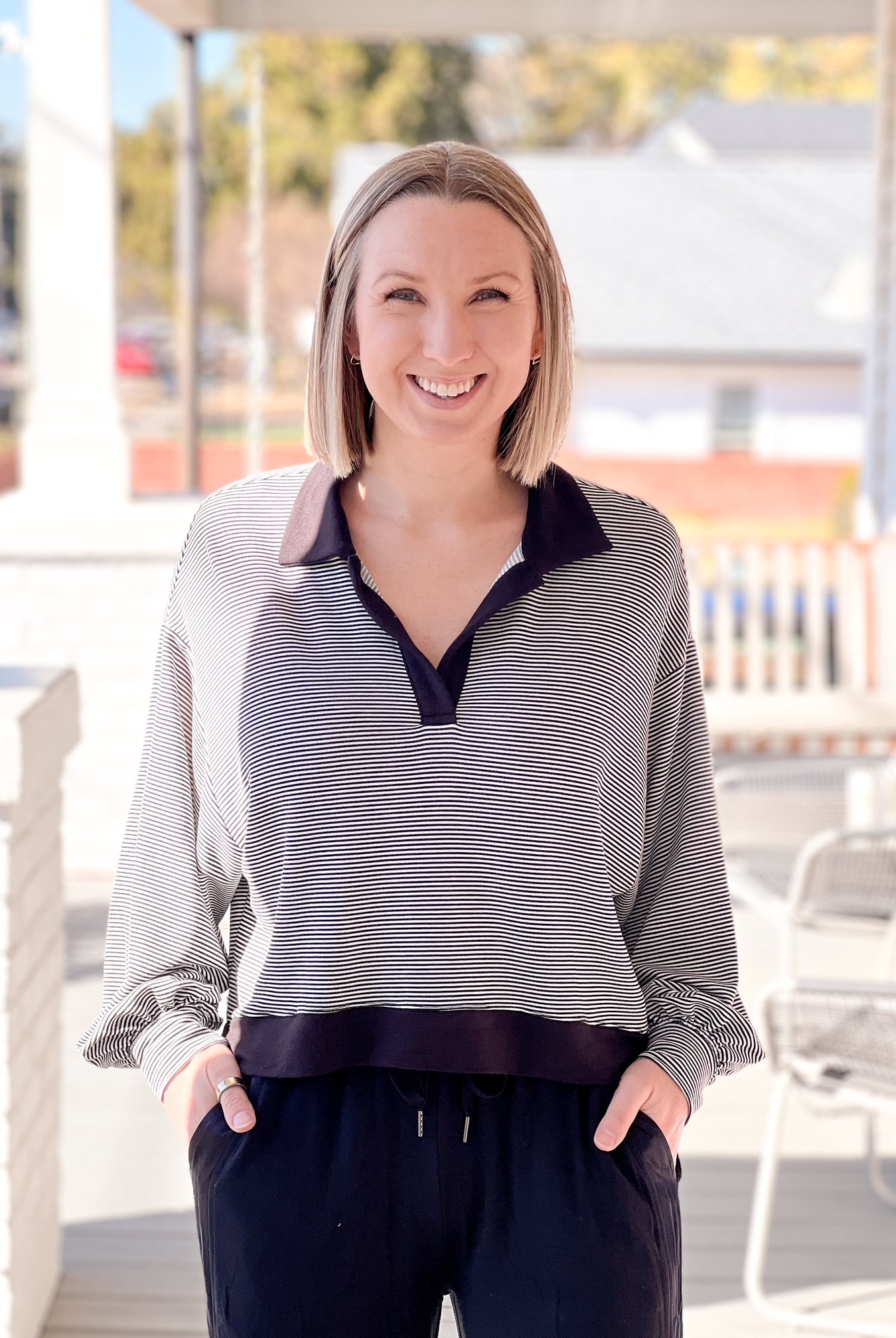 long sleeve shirt with collared neckline, black and white stripes
