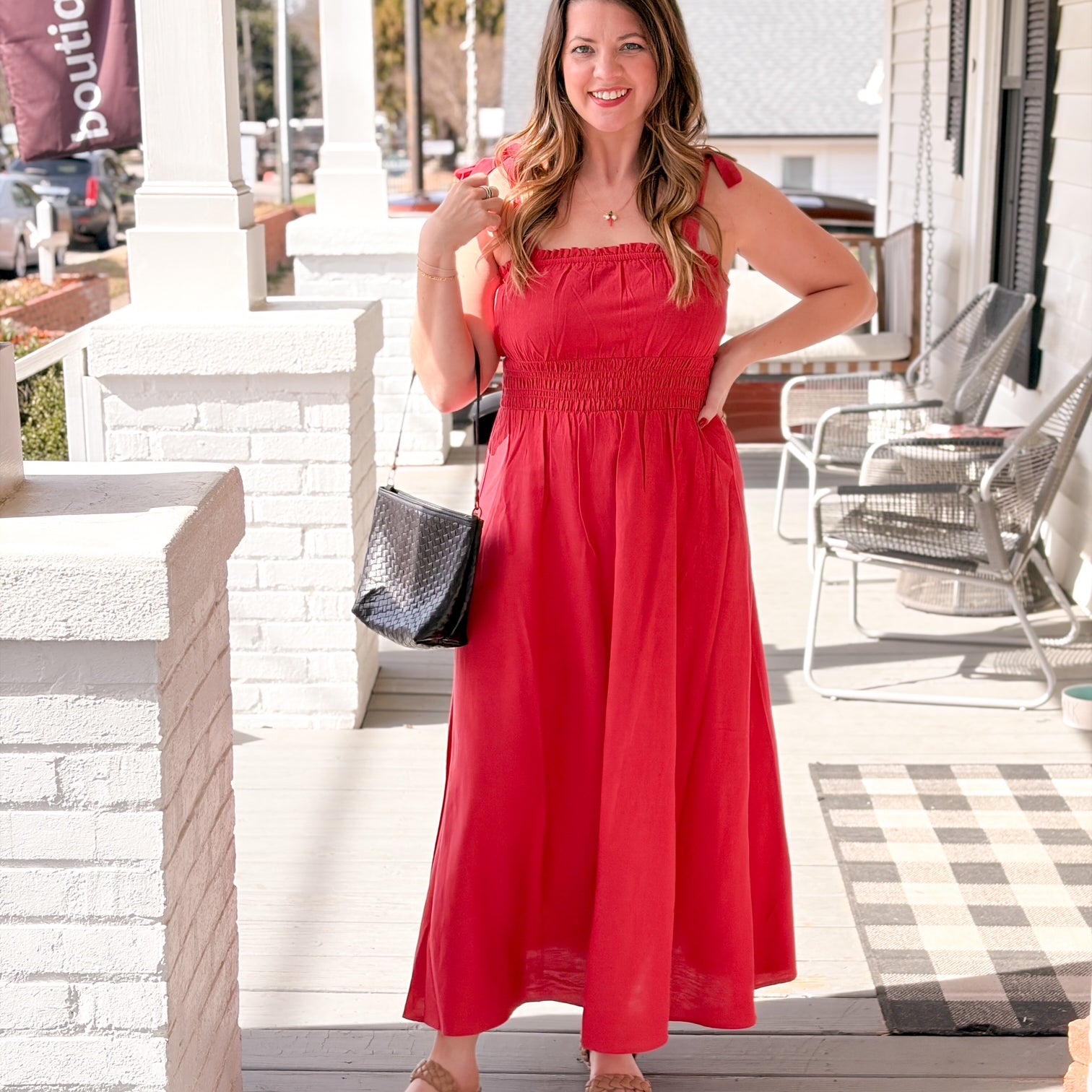red midi length dress with tie straps