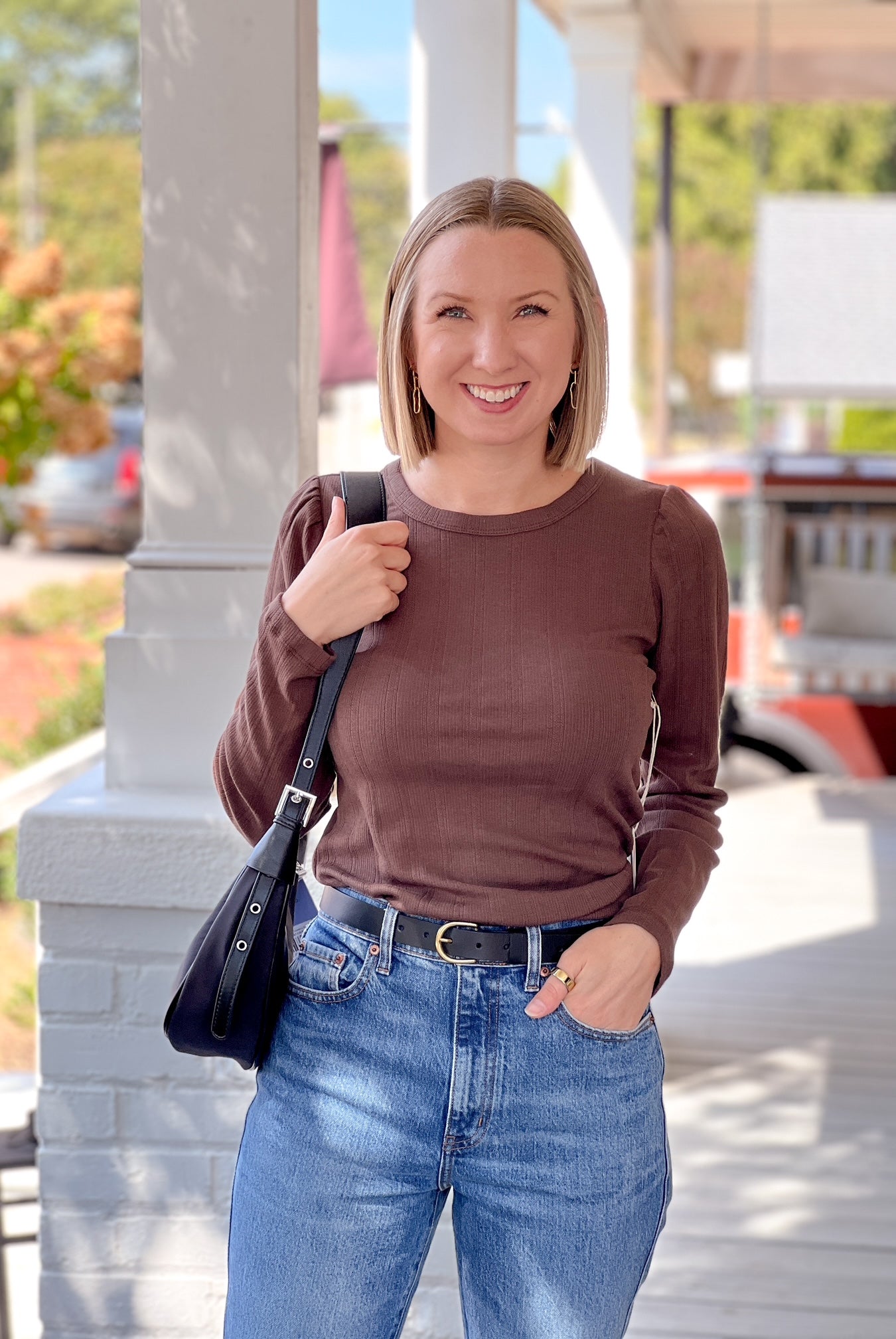 dark brown long sleeve top with crew neckline