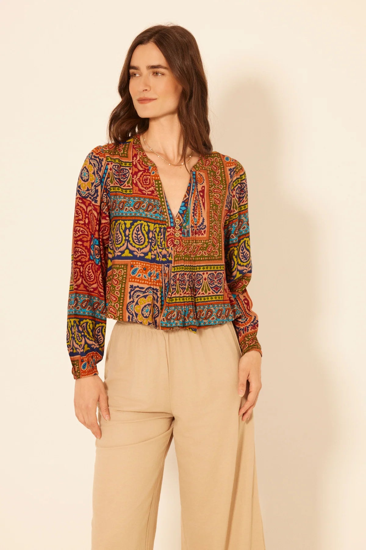 multi colored long sleeve printed top