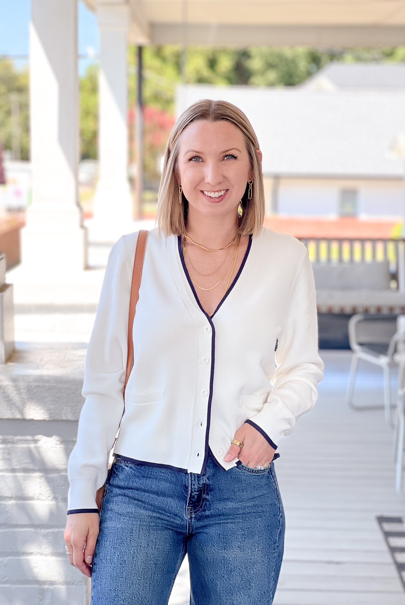 white cardigan with navy outline