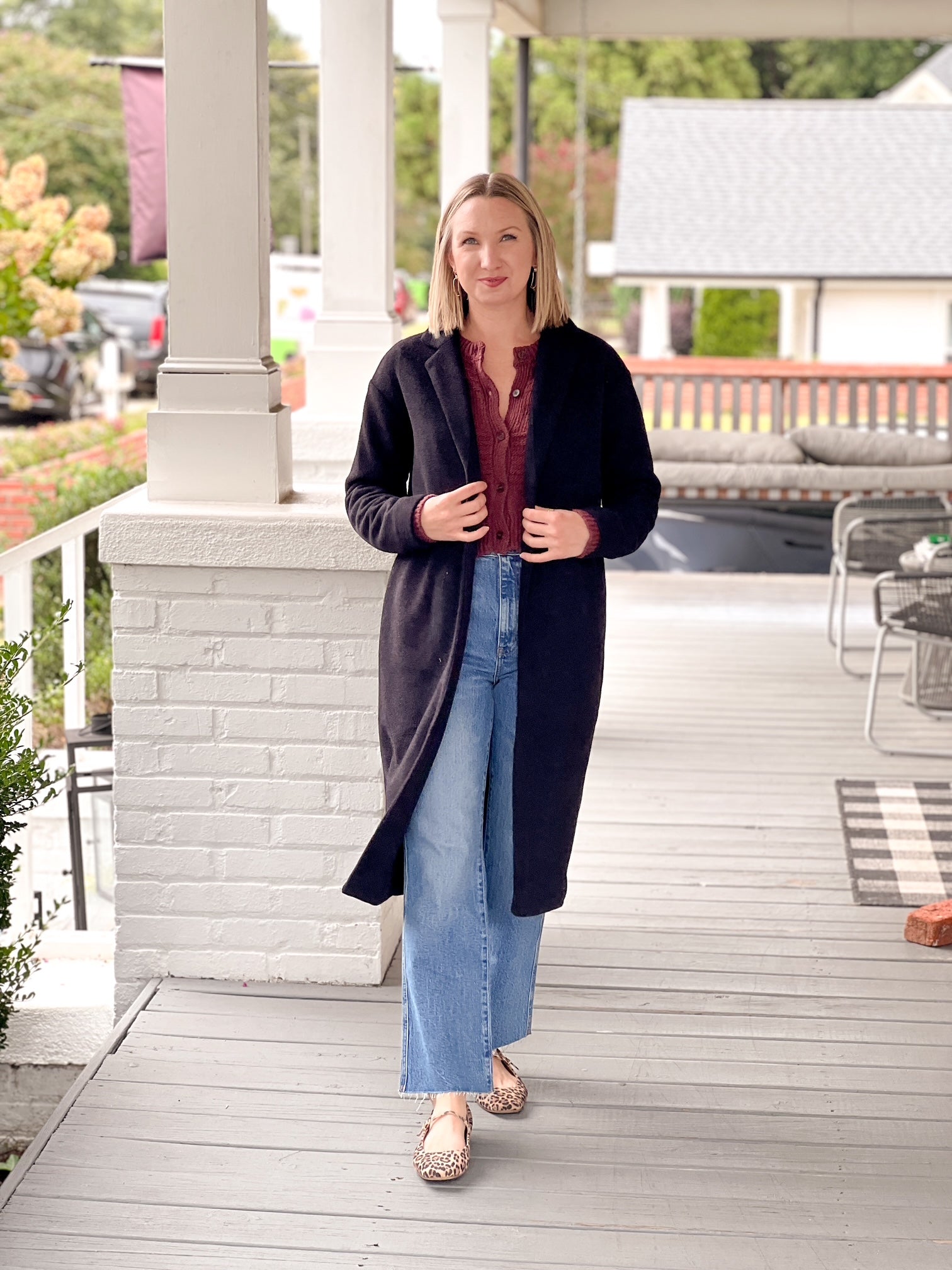 black midi length winter coat