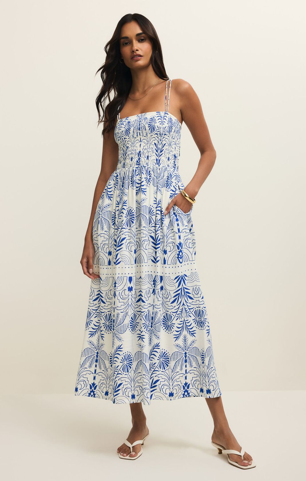 blue and white patterned dress, midi length, spaghetti straps