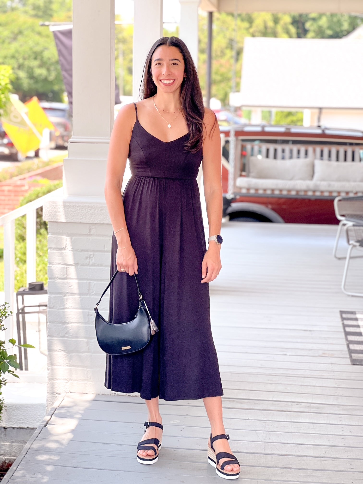 black jumpsuit wide leg sleeveless