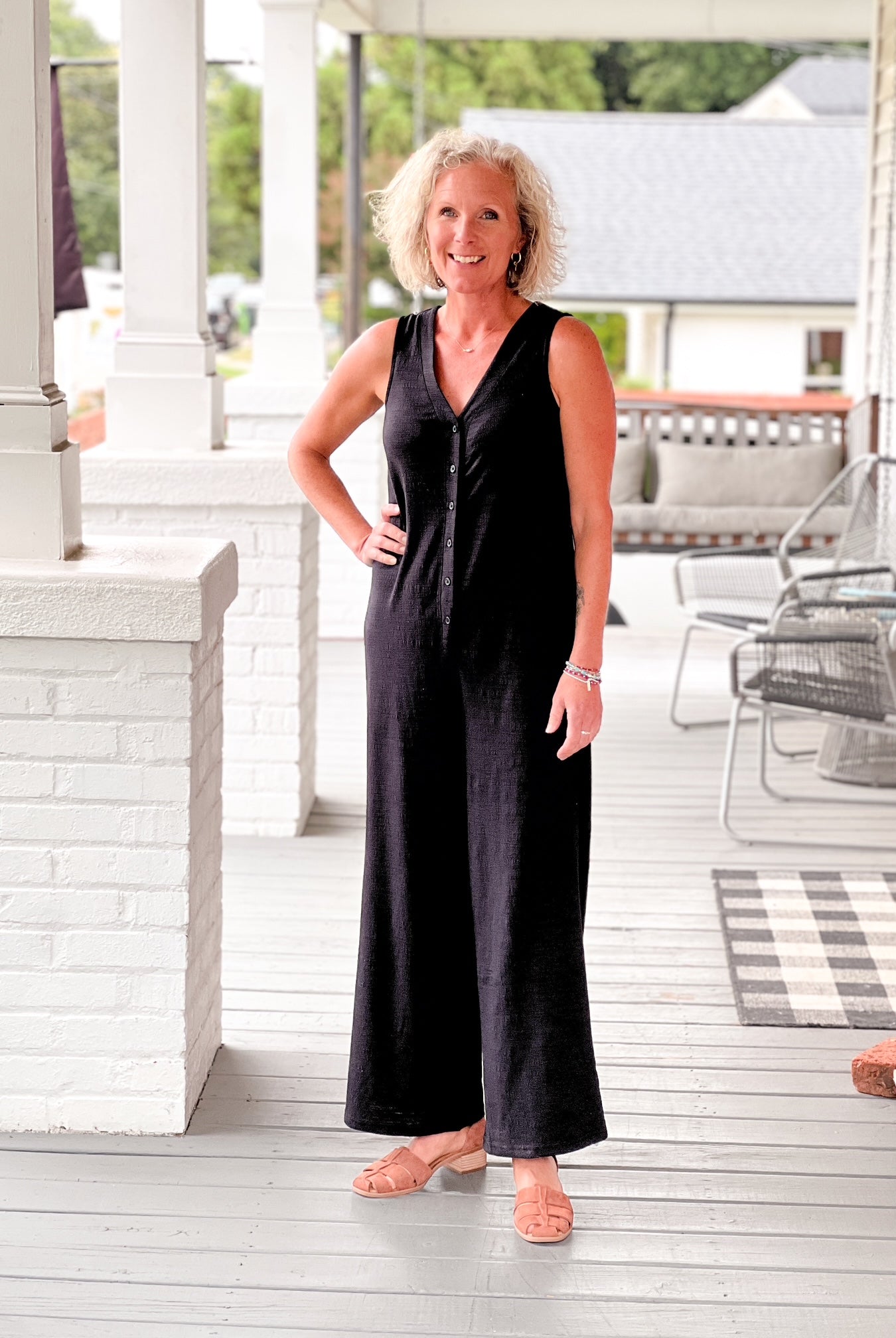 black comfy v neck jumpsuit with wide legs, sleeveless