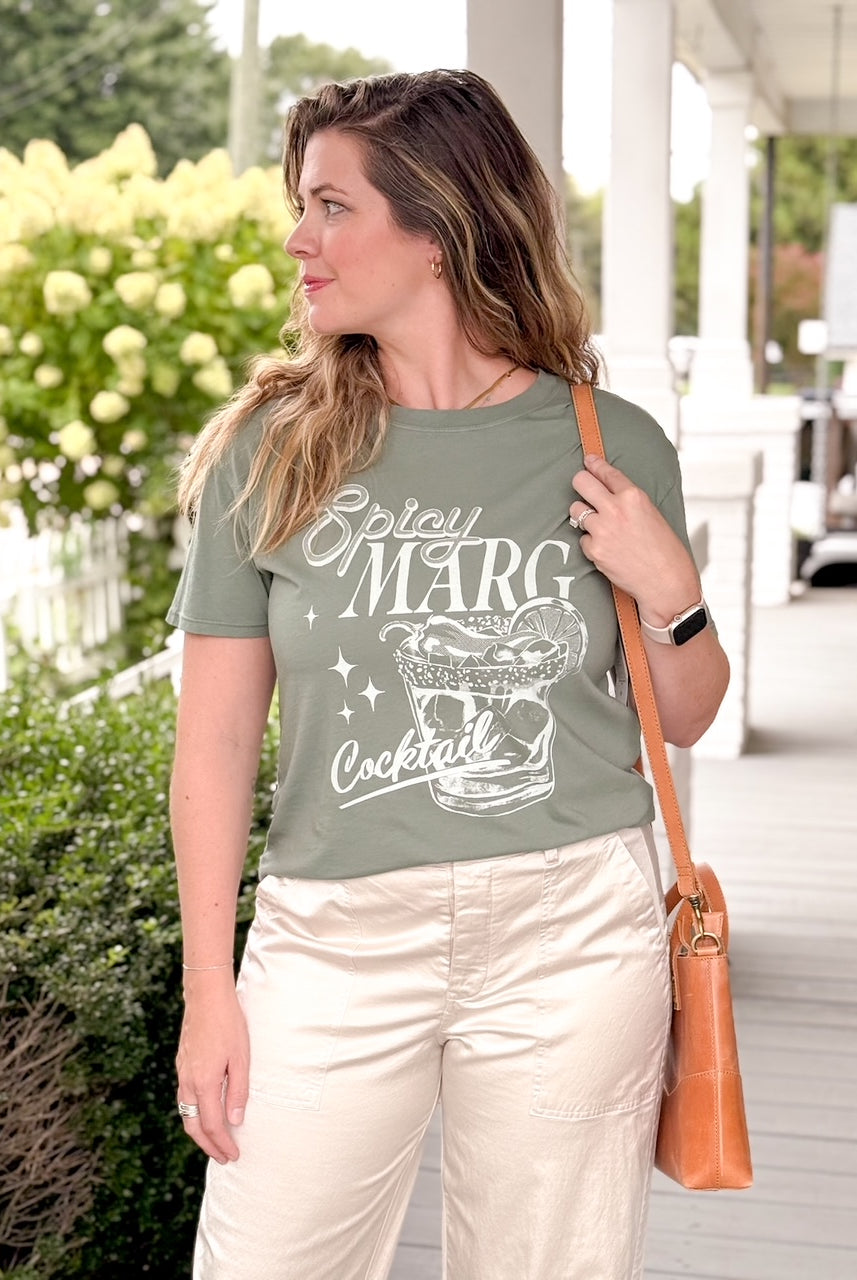 hunter green short sleeve top with spicy marg written on it