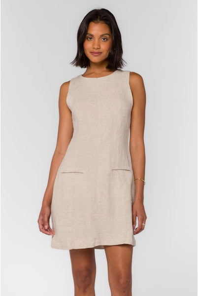 sleeveless mini length linen dress in a wheat color