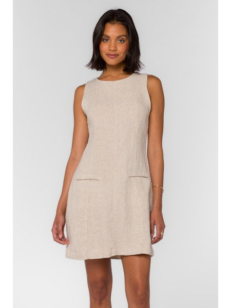 sleeveless mini length linen dress in a wheat color
