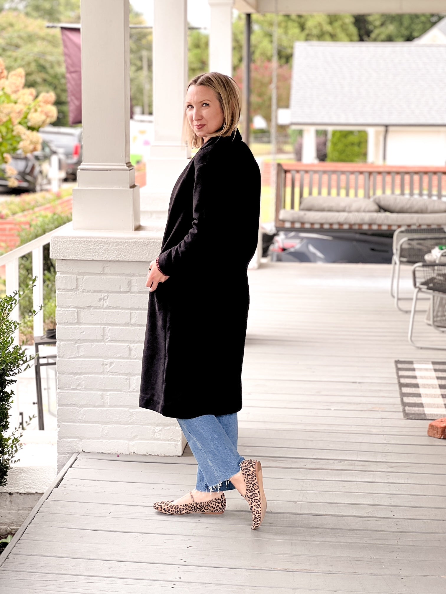 black midi length winter coat