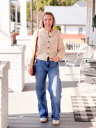 beige cardigan with tiny multi colored hearts
