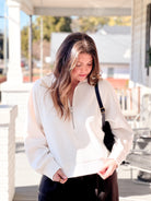 white textured pullover