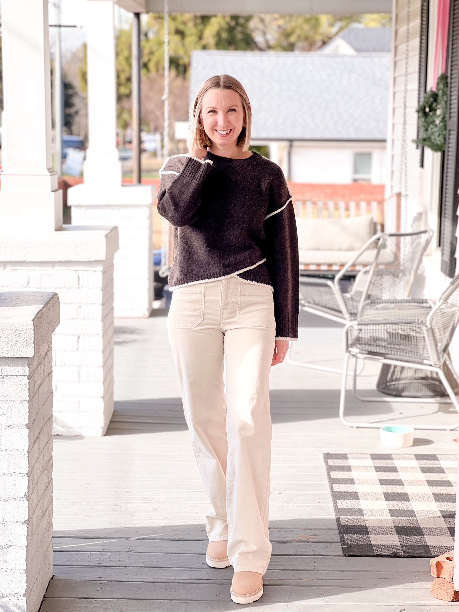 long sleeve brown cardigan with crew neckline and contrasting hem