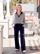 long sleeve shirt with collared neckline, black and white stripes