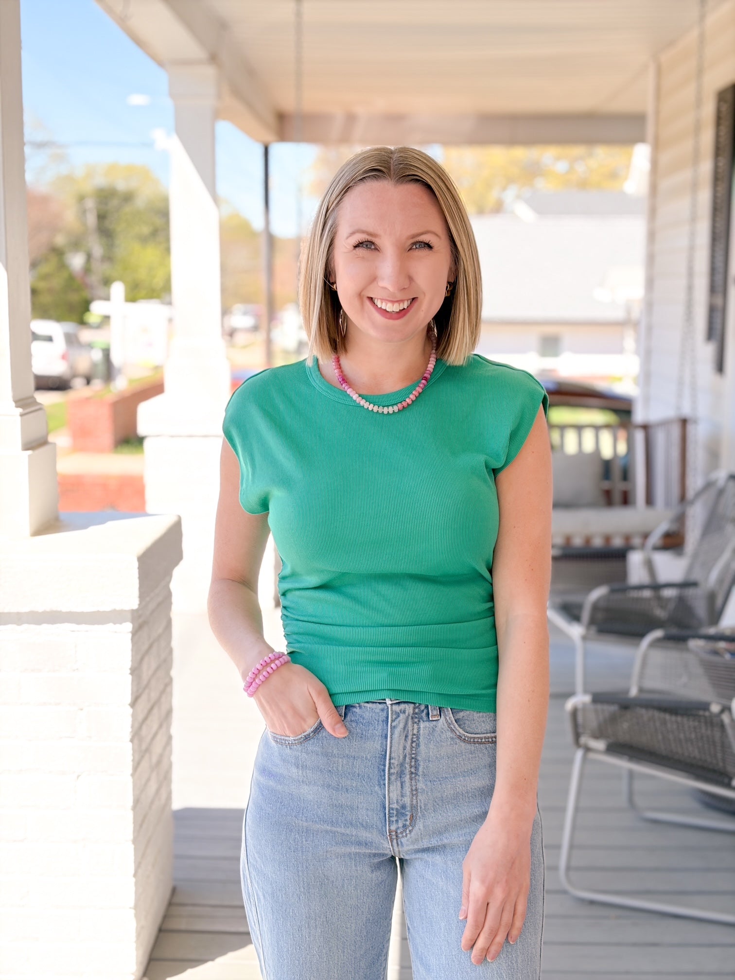 sleeveless green top