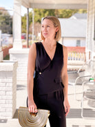 black jumpsuit with v neckline