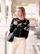 Long Sleeve Cardigan with a Bow Print