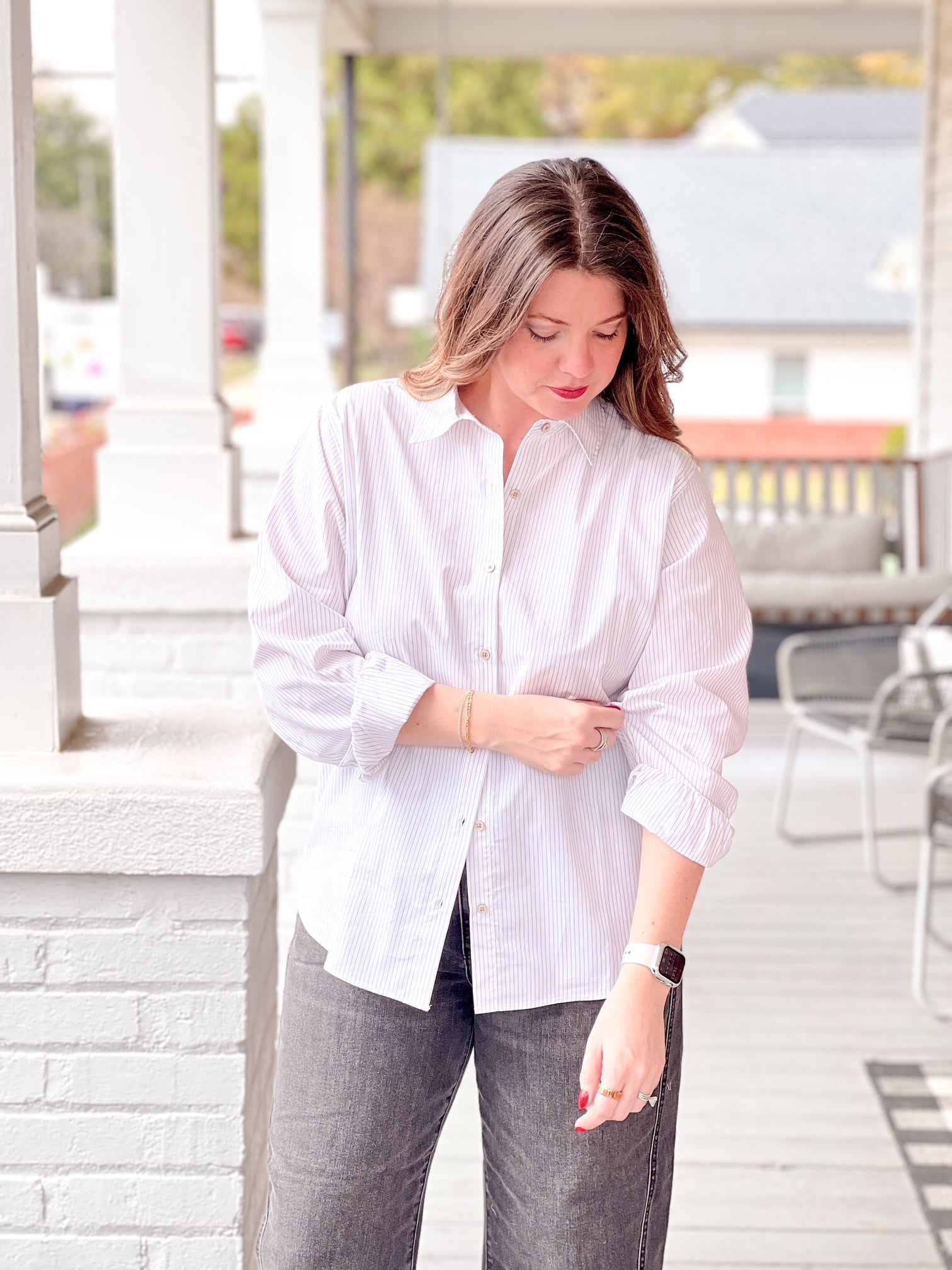 white button up top with gold stripes