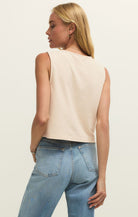 white sleeveless top with v neckline and buttons