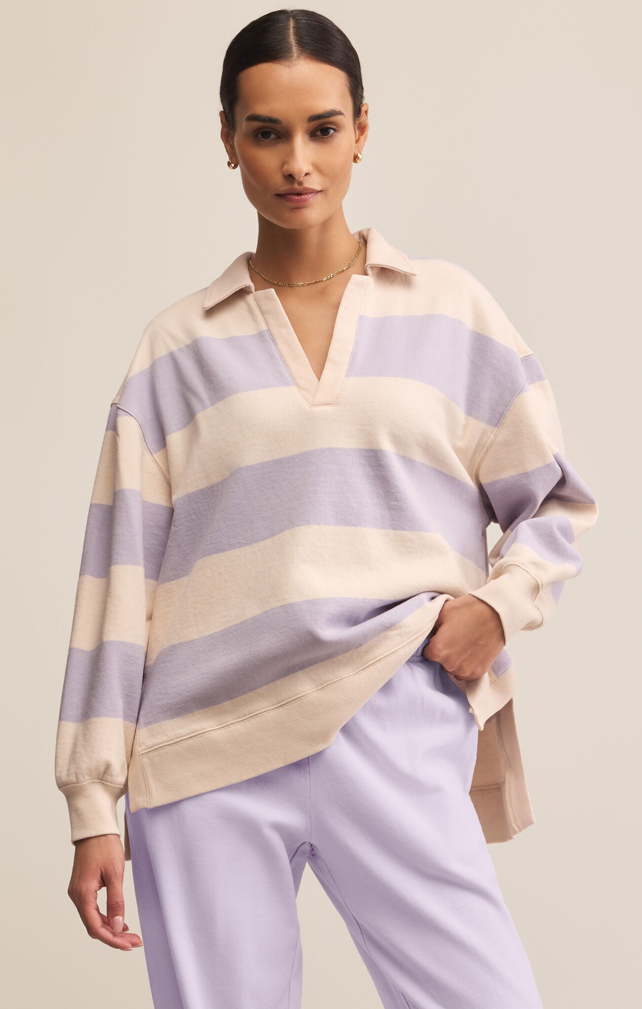 sweatshirt with light lavender stripes and v neckline