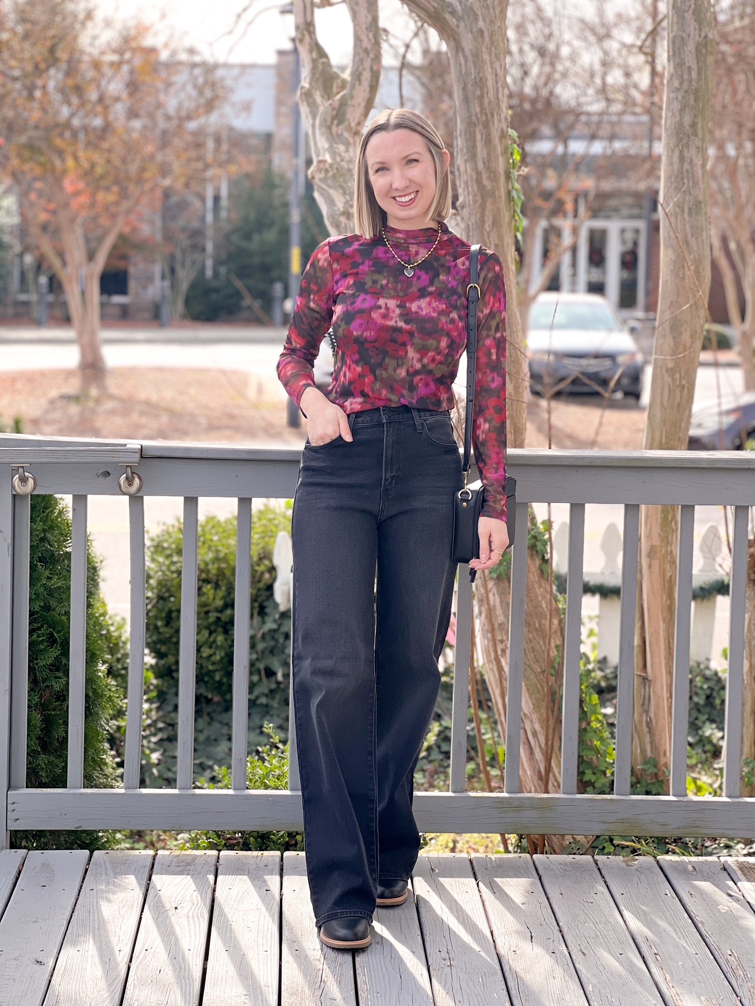long sleeve top with crew neckline and berry floral pattern