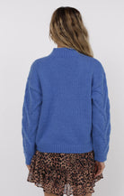 blue sweater with herringbone pattern