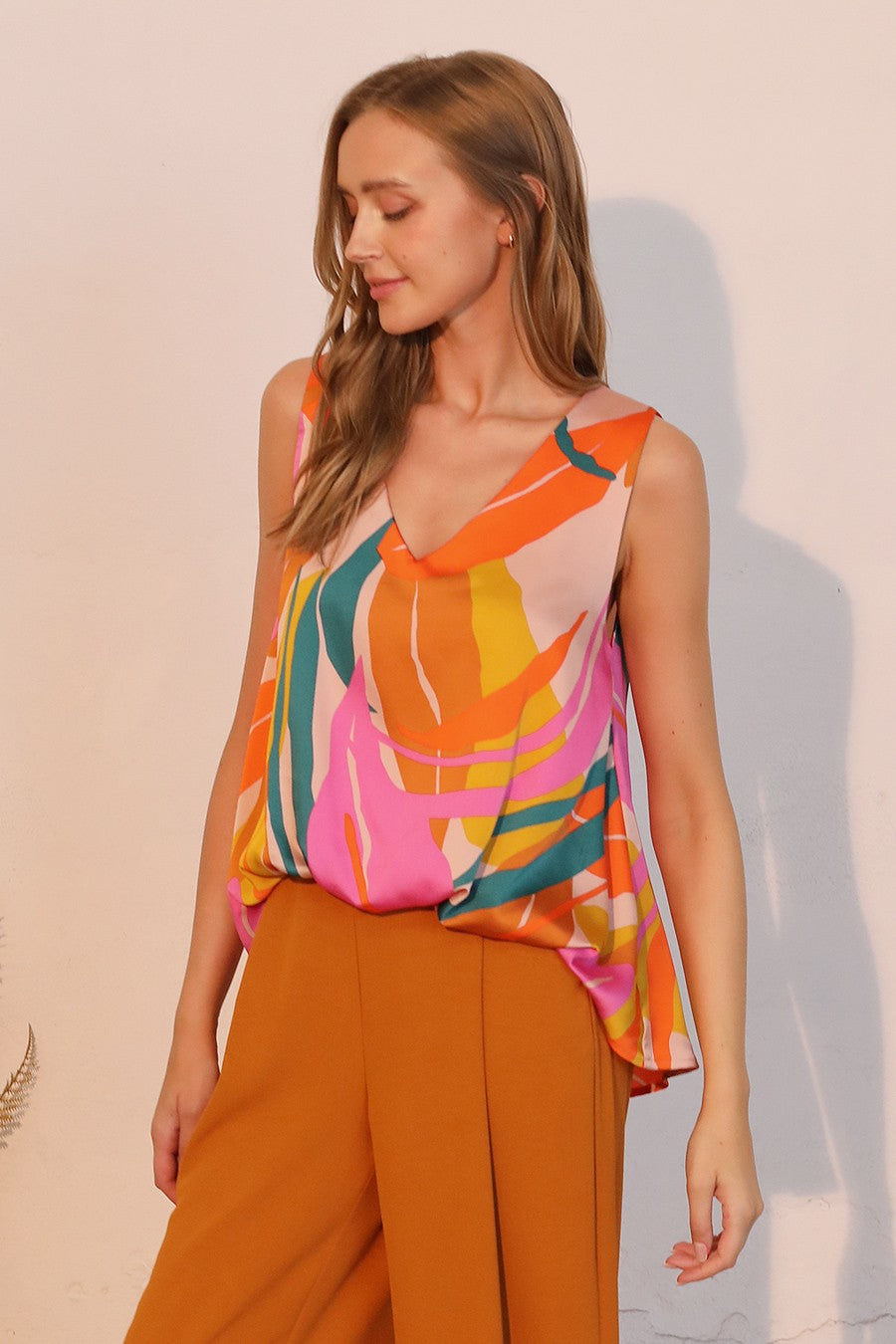sleeveless tank with v neckline, bright abstract pattern