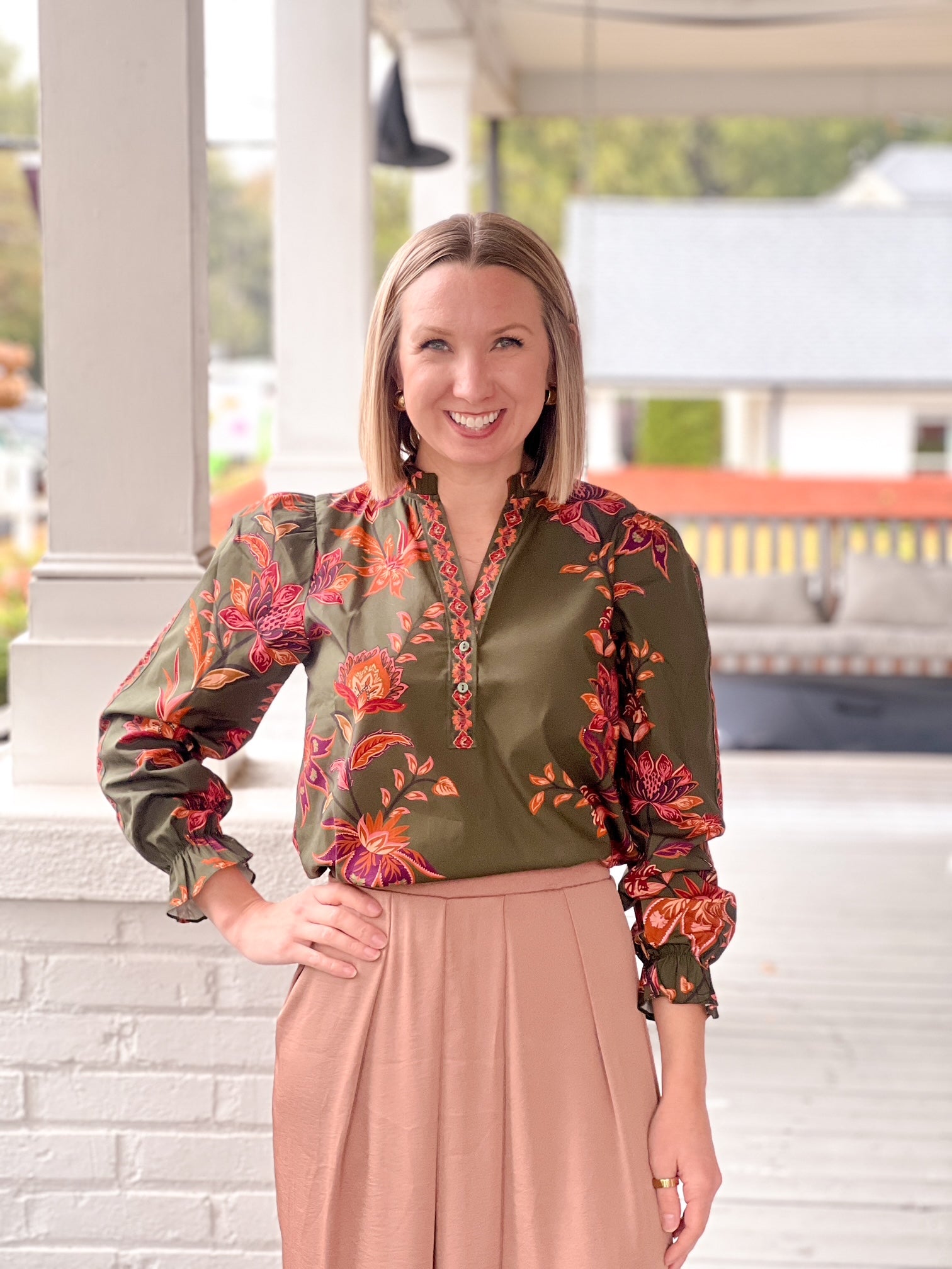 long sleeve work top in olive with pink and orange floral pattern